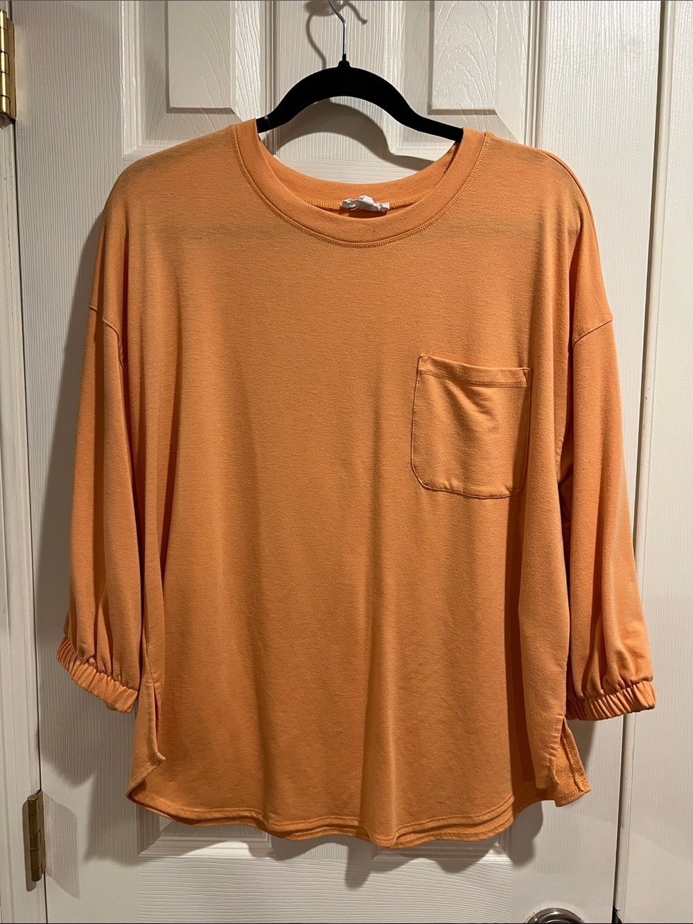 Westbound Women's Long Sleeve Pocket Tee in Peach Orange